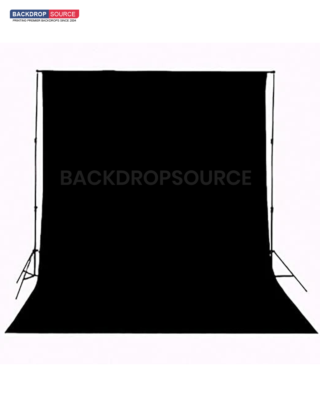 Solid black studio muslin backdrop for professional photography sessions, ideal background solution for portraits.