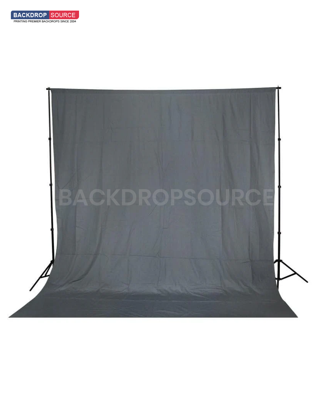 Grey photography muslin background featuring a seamless, professional studio setup for modern portrait shoots.