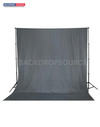 Grey photography muslin background featuring a seamless, professional studio setup for modern portrait shoots.