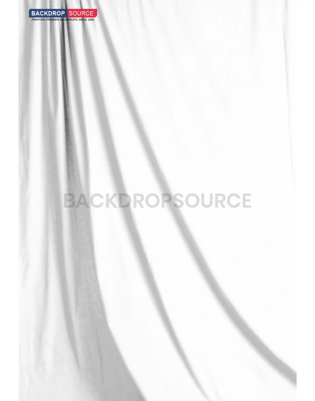 Solid white muslin photography backdrop for professional studio shoots and seamless background effects.