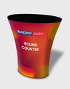 Round fabric display counter used as a podium for exhibitions, offering professional and stylish presentation.