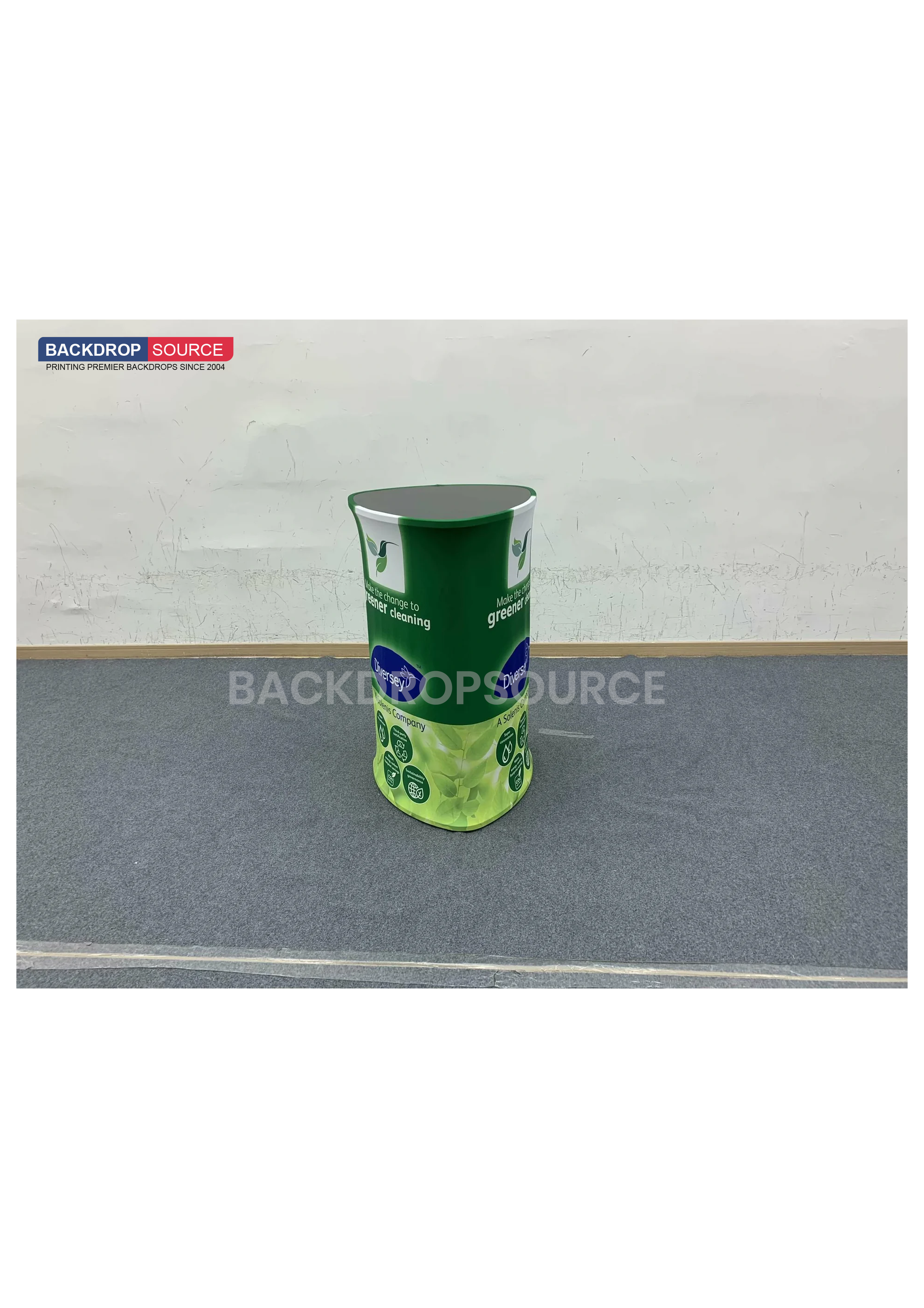 Triangle Fabric Display Counter at podium booth exhibitions, premium quality exhibition stand for events and trade shows.