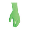 Person demonstrating chroma key technique using green gloves for seamless background removal in video production.