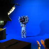 Professional studio setup featuring advanced chroma key technology with a seamless blue screen backdrop for video production.